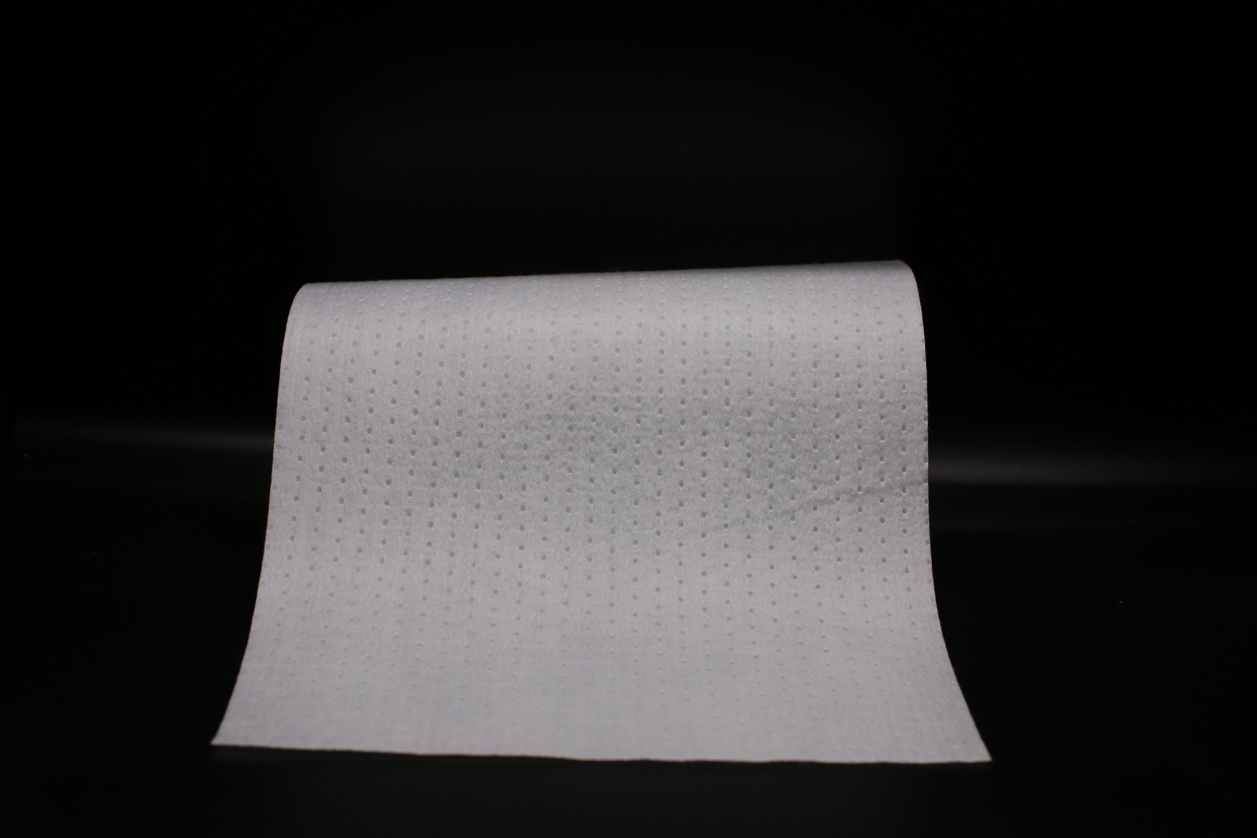 Tela No Tejida en Relieve y Ligeramente Elástica para la Fabricación de Paneles Laterales Elásticos